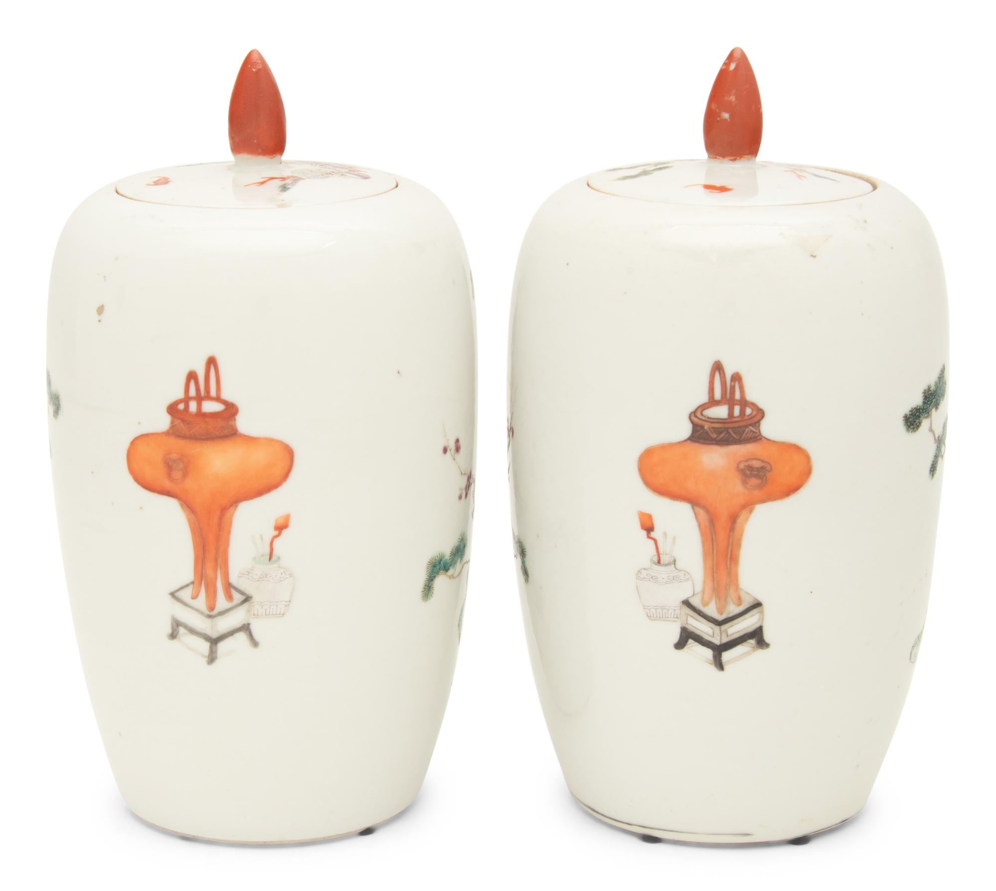 A Pair of Famille Rose Porcelain Ovoid Jars and Covers