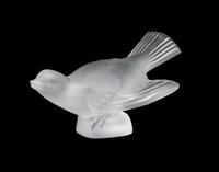 A Lalique Molded and Frosted Glass Figure Height 3 1/4 x width 5 inches.