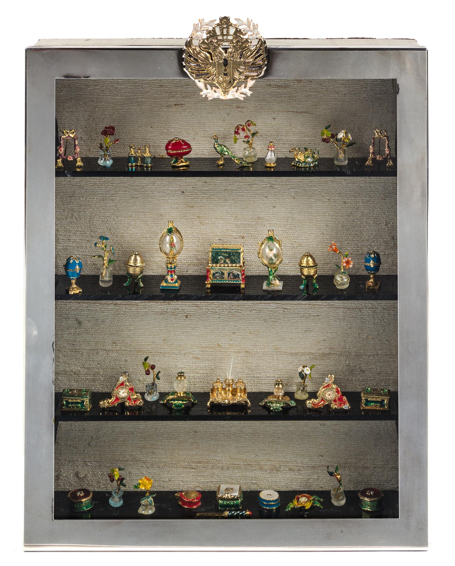 A Collection of Gilt Bronze and Enameled "Faberge" Series Table Articles Height of silver-plate case 10 3/4 inches. — Eugene Kupjack
