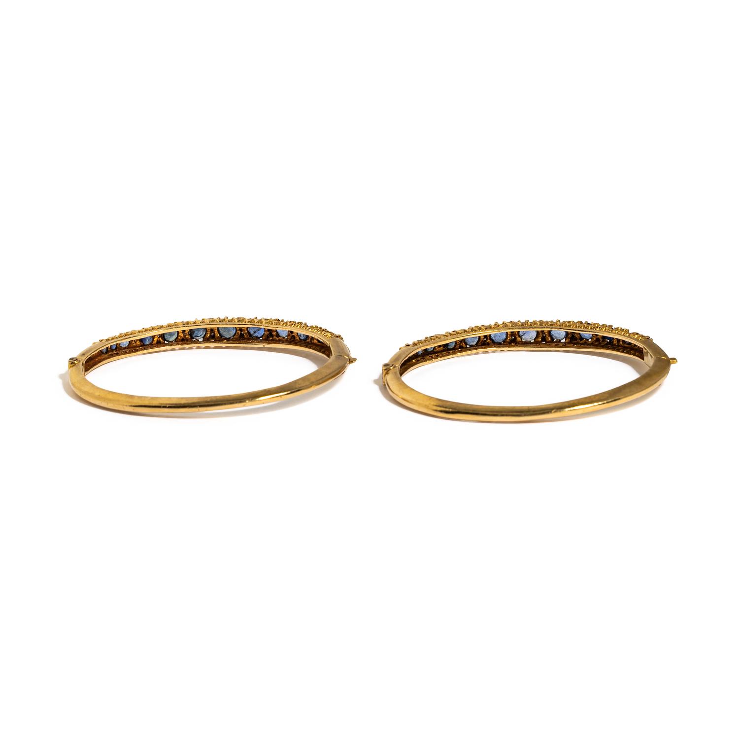 PAIR OF YELLOW GOLD, SAPPHIRE, AND DIAMOND BANGLE BRACELETS