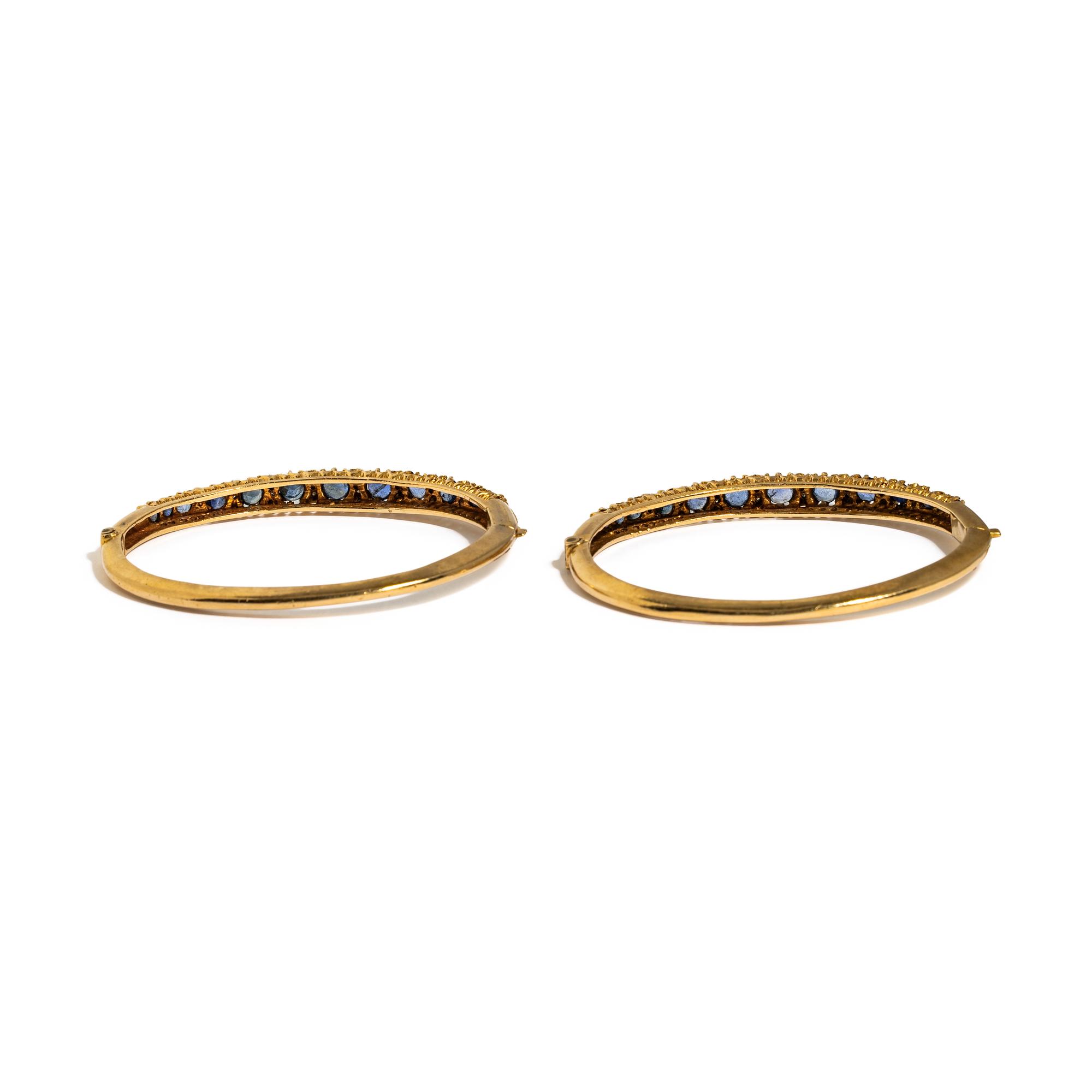 PAIR OF YELLOW GOLD, SAPPHIRE, AND DIAMOND BANGLE BRACELETS