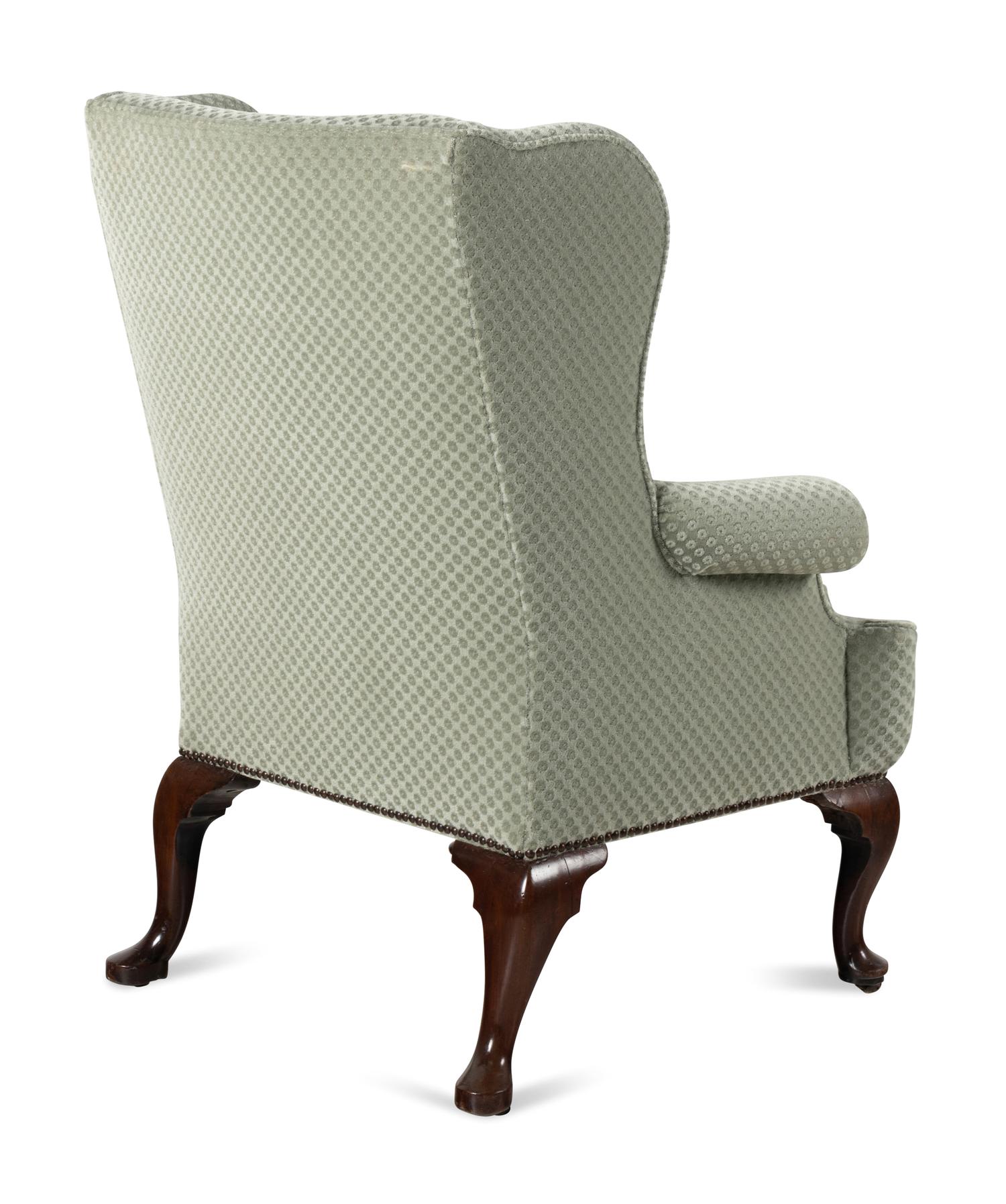 A Queen Anne Walnut Wingback Armchair