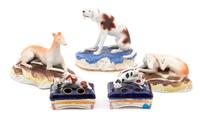A Group of English Porcelain and Ceramic Dog Articles