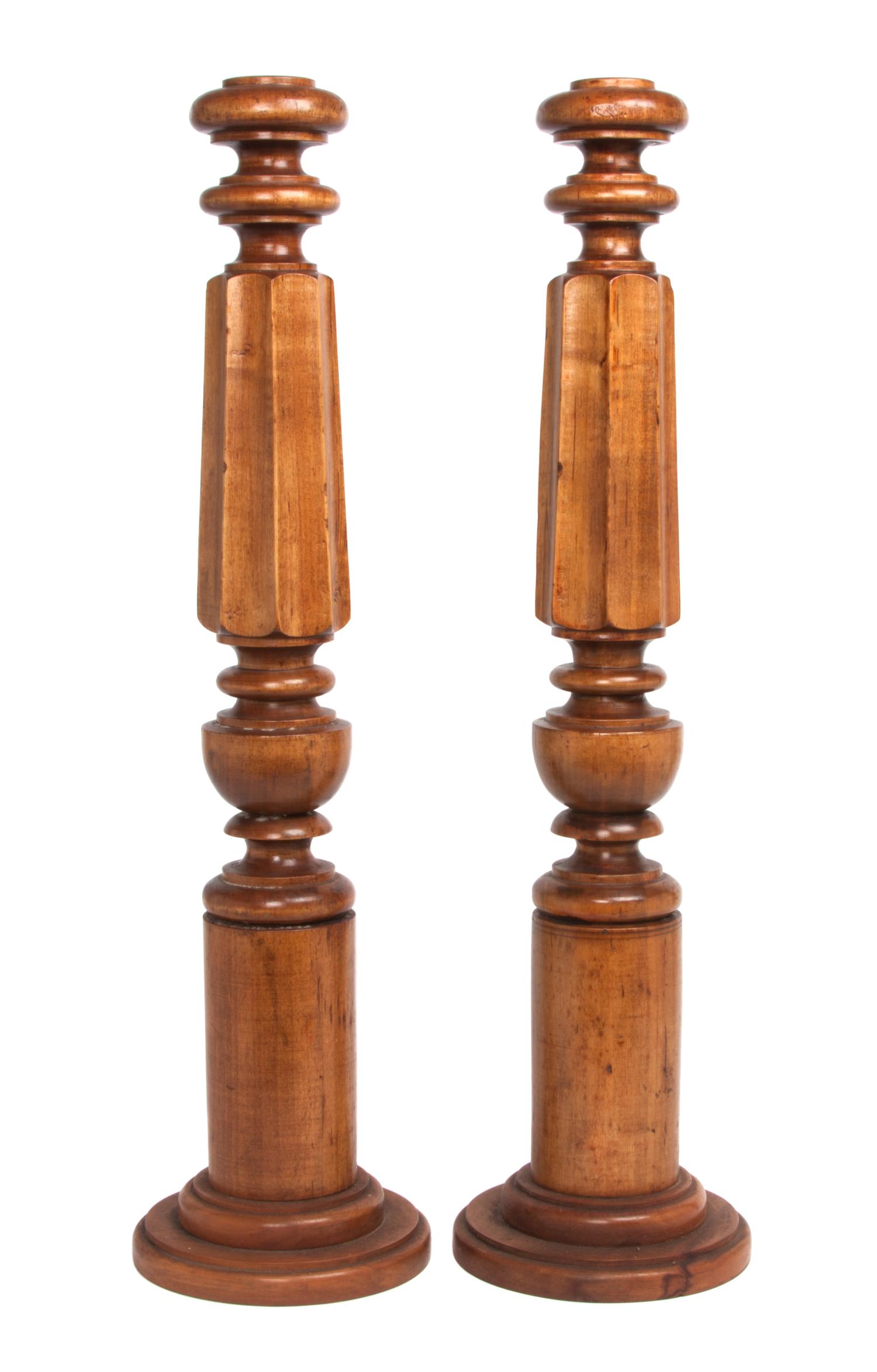 A Pair of Oversized Turned Wood Candlesticks Height 27 inches. — 20TH CENTURY