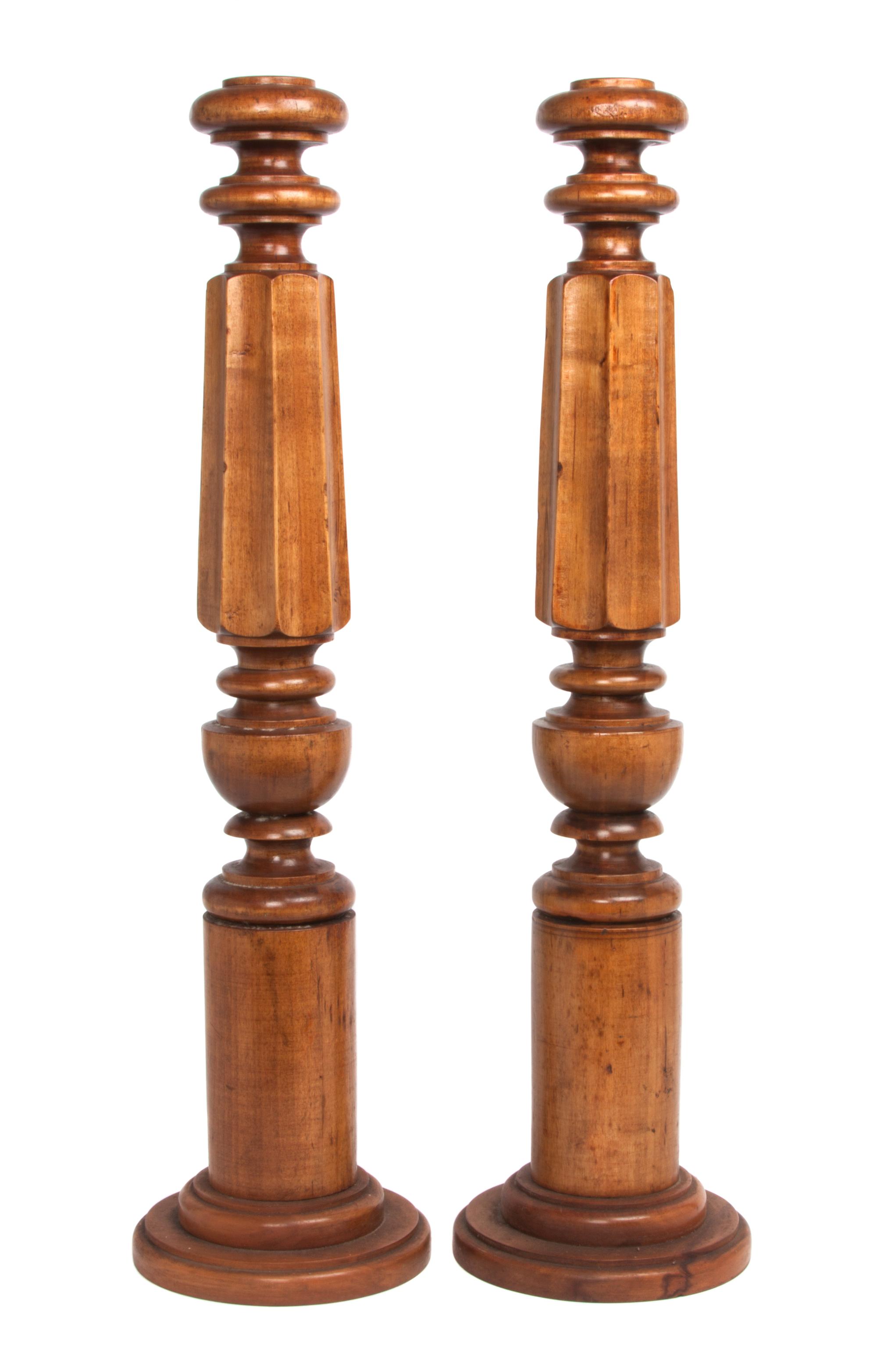A Pair of Oversized Turned Wood Candlesticks Height 27 inches. — 20TH CENTURY