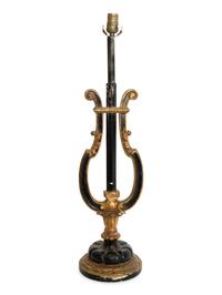 A Italian Ebonized Giltwood Harp-Form Lamp