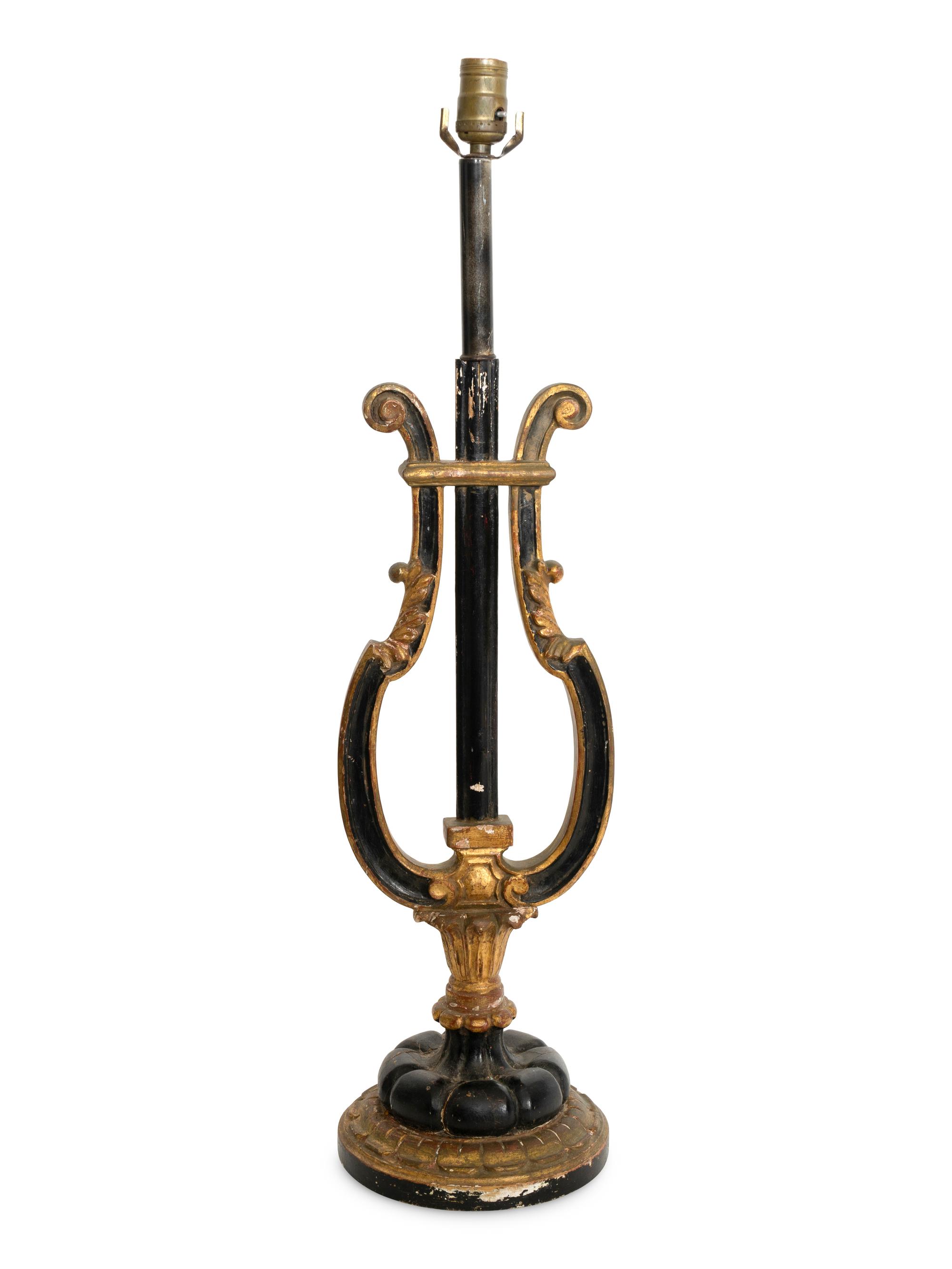 A Italian Ebonized Giltwood Harp-Form Lamp