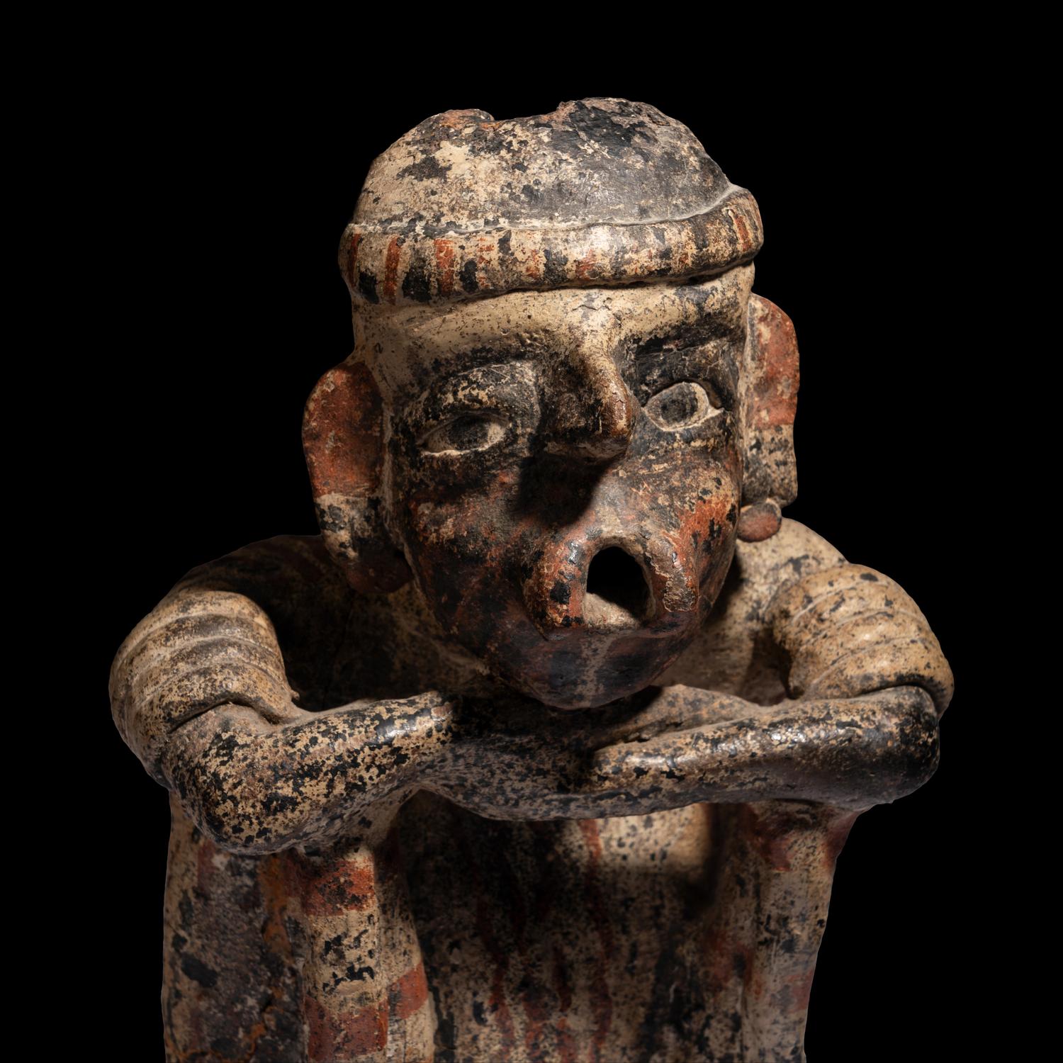 A Nayarit Seated Figure