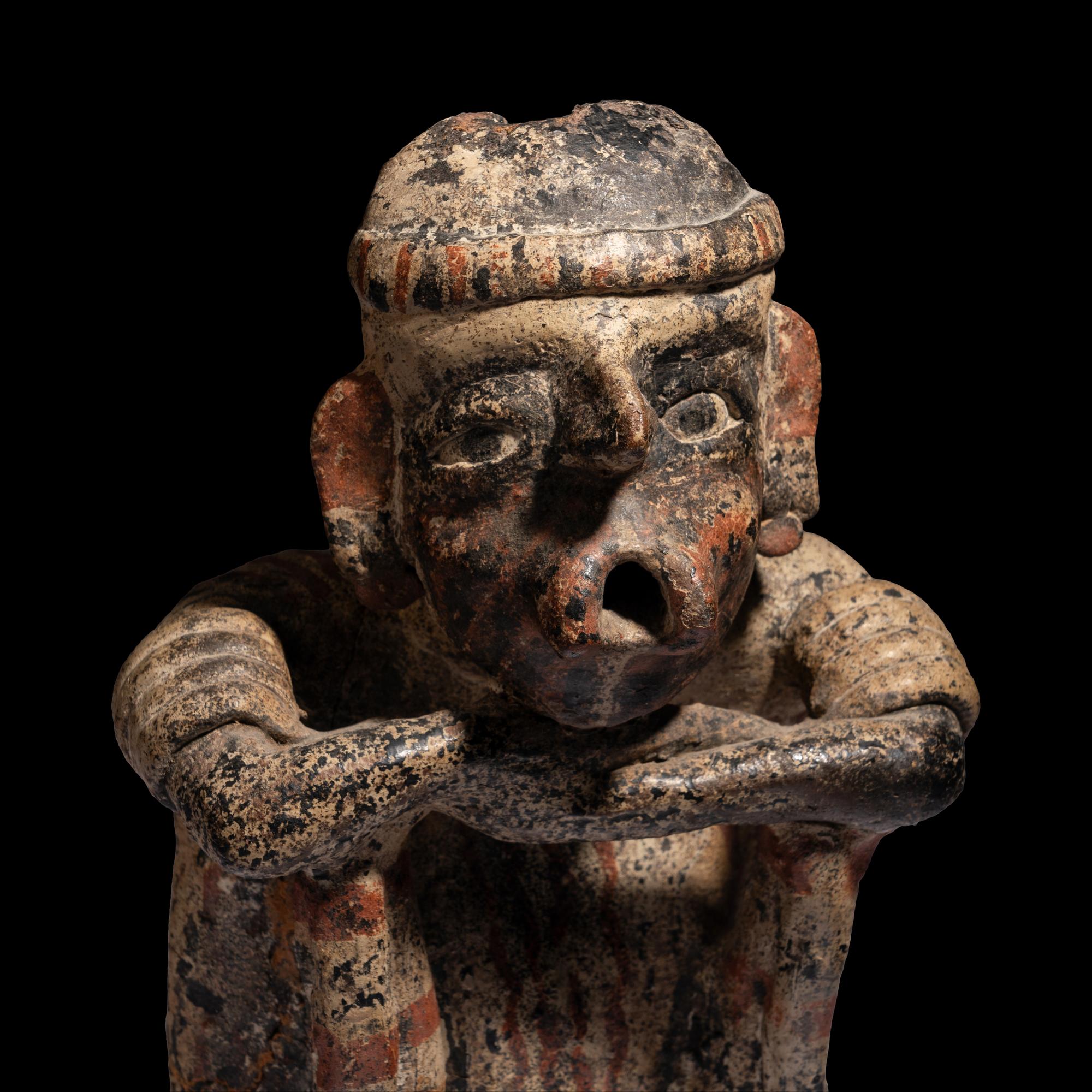 A Nayarit Seated Figure