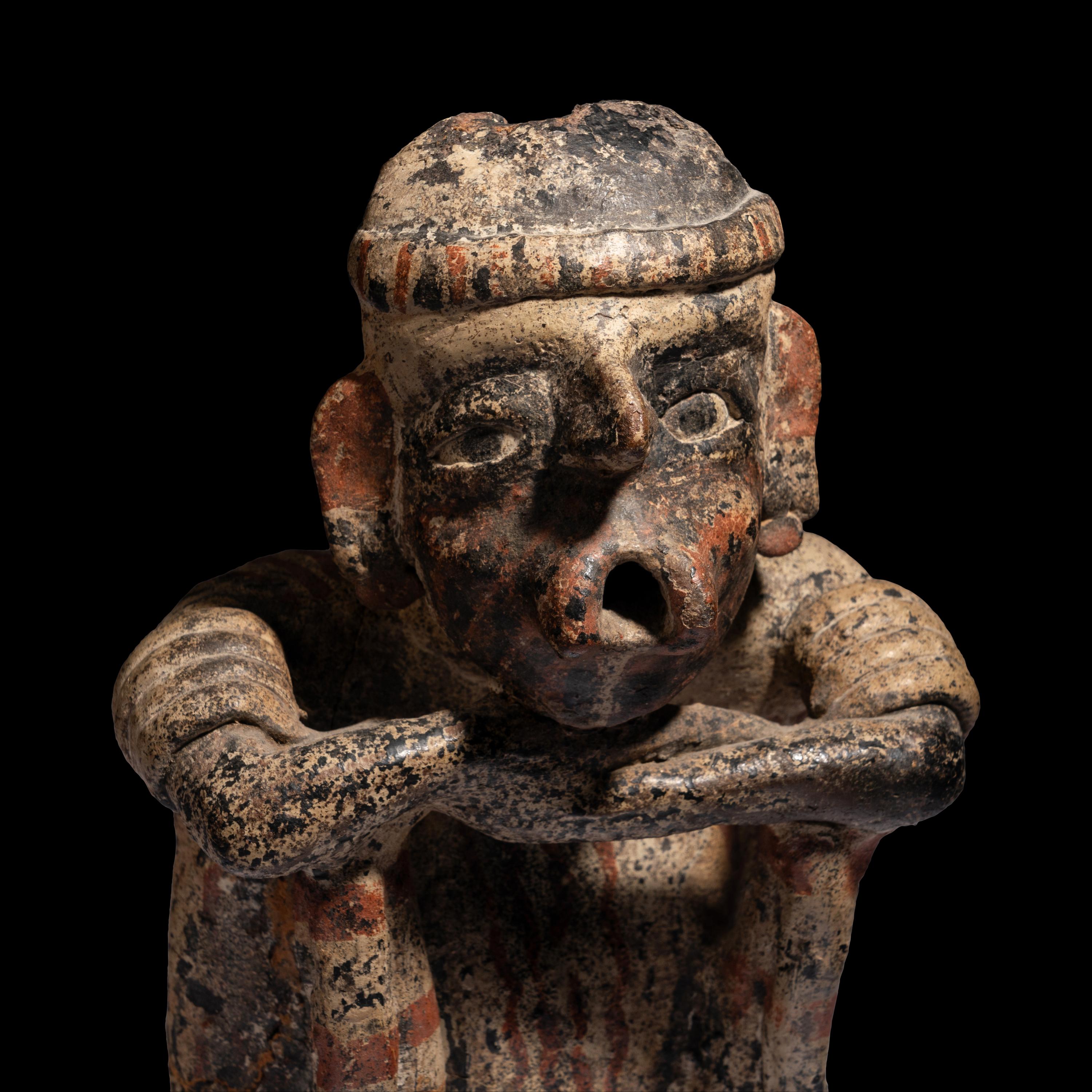 A Nayarit Seated Figure