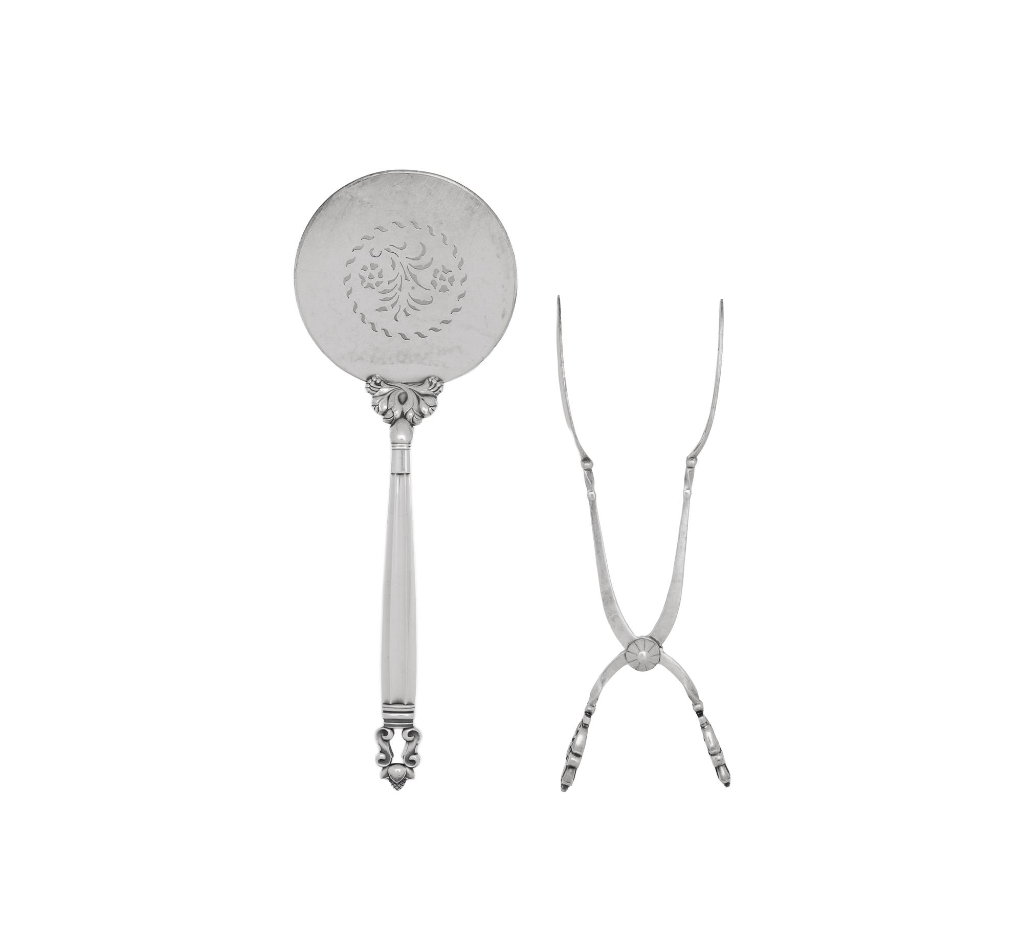 A Georg Jensen Acorn Silver Tomato Server and Asparagus Tongs