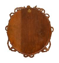 A Continental Porcelain Plaque in a Carved Oak Frame