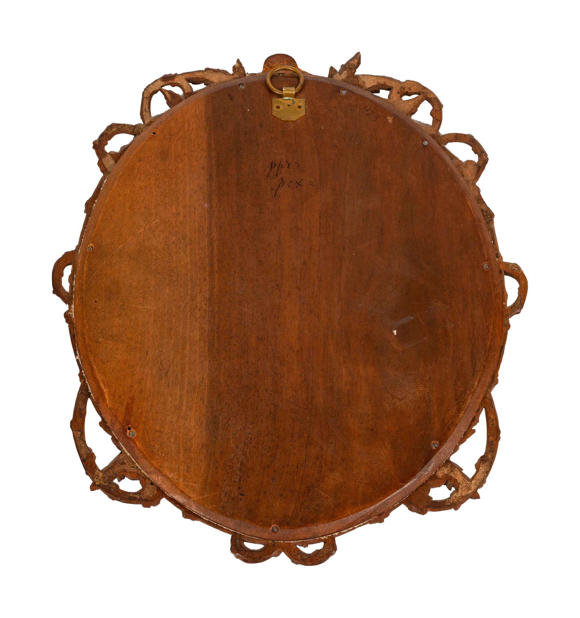 A Continental Porcelain Plaque in a Carved Oak Frame
