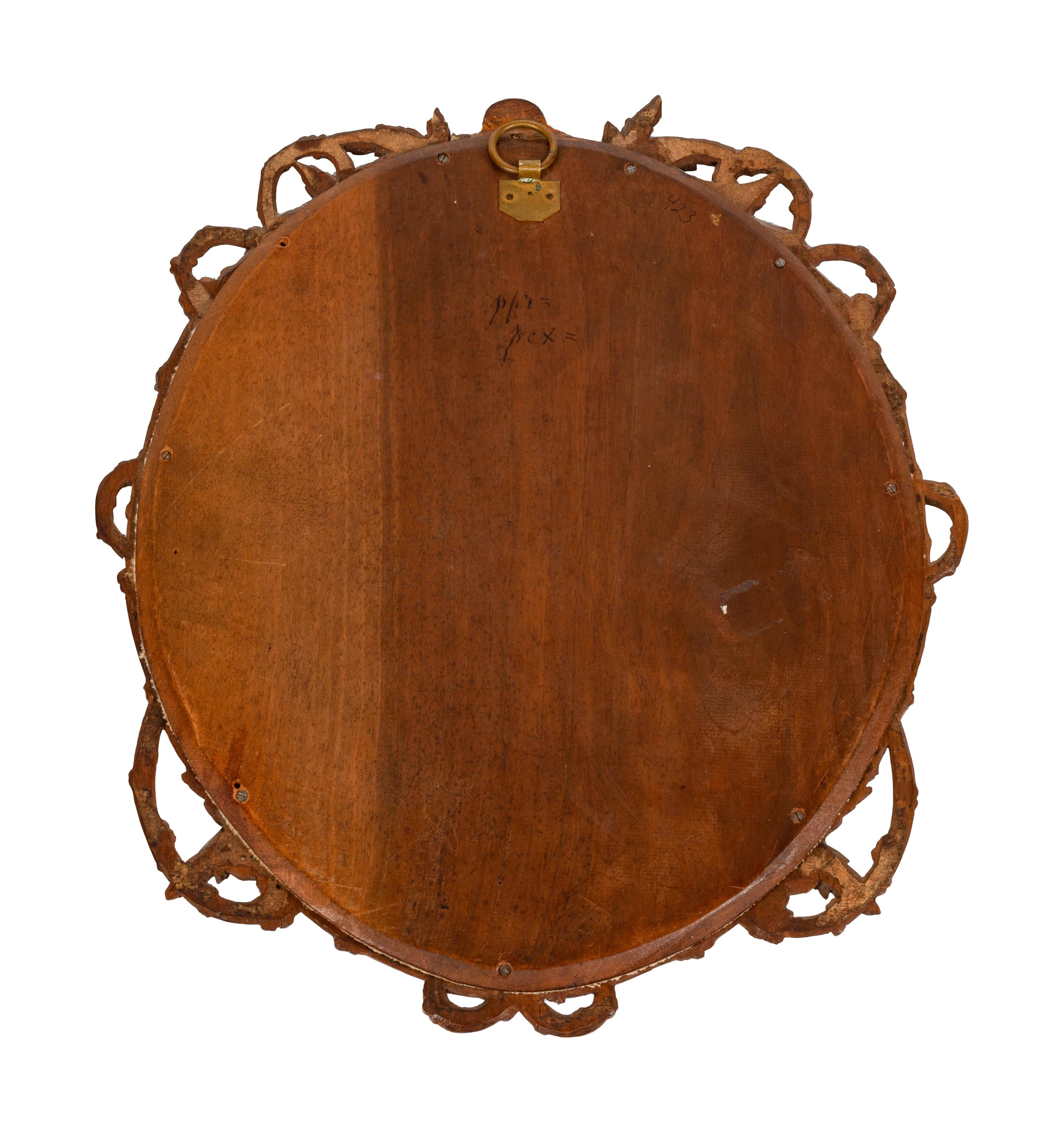 A Continental Porcelain Plaque in a Carved Oak Frame