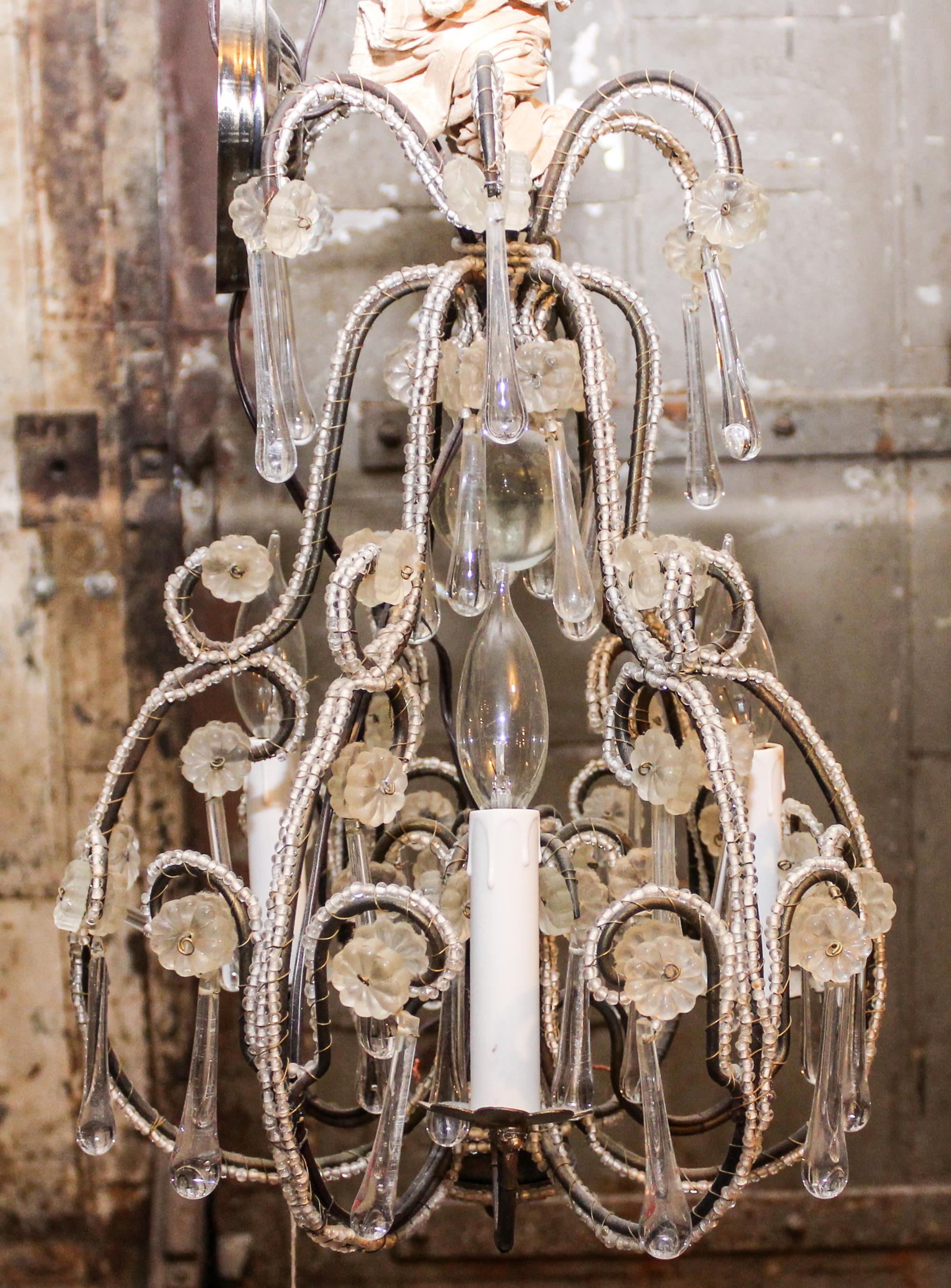 A Beaded Chandelier. Height 16 1/2 inches.