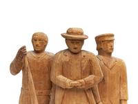 A Folk Art Carved Pine Group of Lumberjacks
