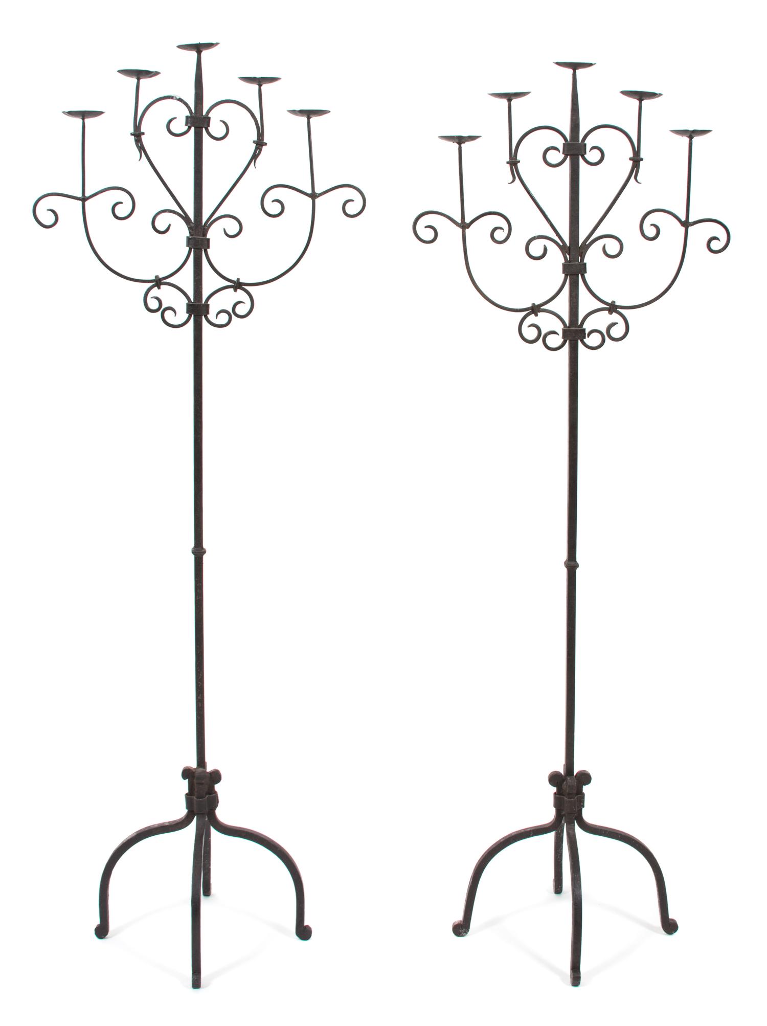 A Pair of Wrought Iron Five-Light Torcheres Height 63 1/2 inches. — 20TH CENTURY