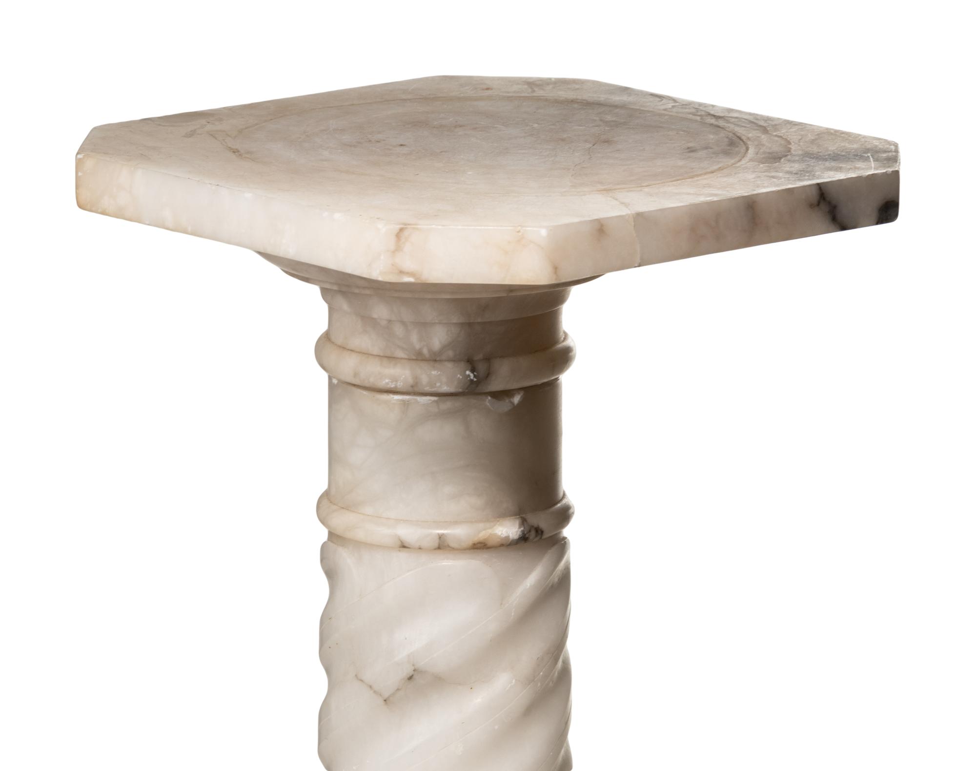 A Continental Carved Marble Pedestal