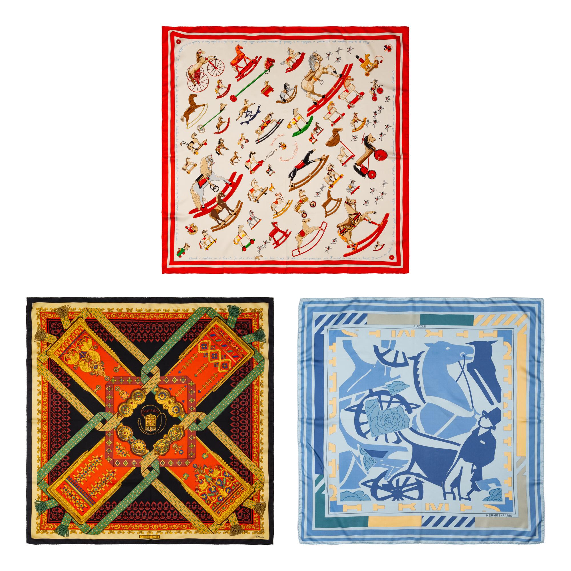 A Group of Three Hermès Silk Scarves