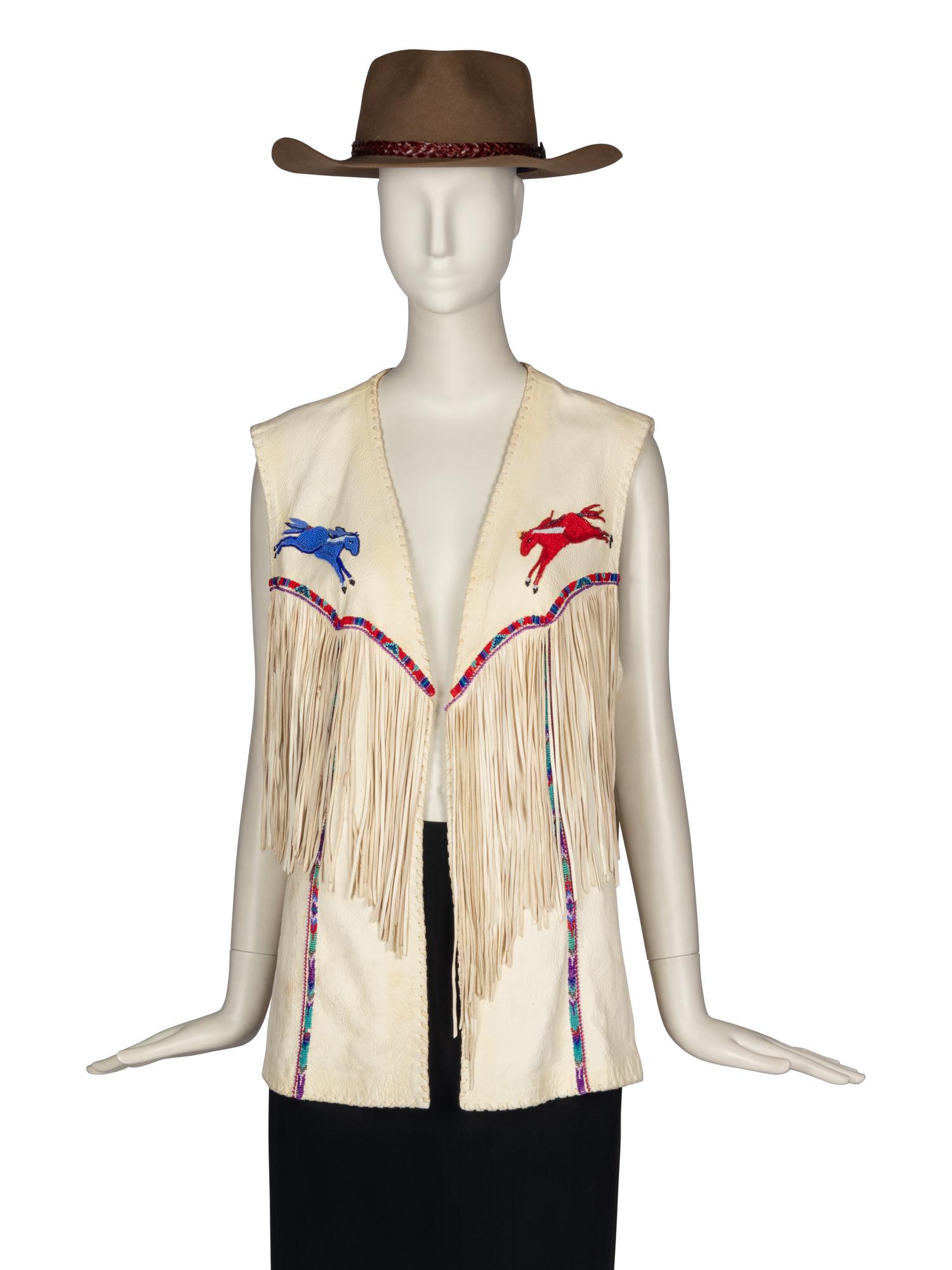 A Beaded Leather Vest with Fringe and Felted Hat