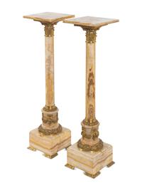 A Pair of French Gilt Bronze Mounted Onyx Pedestals
