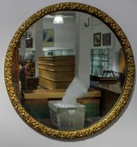 A Circular Giltwood Mirror Diameter 26 1/2 inches.
