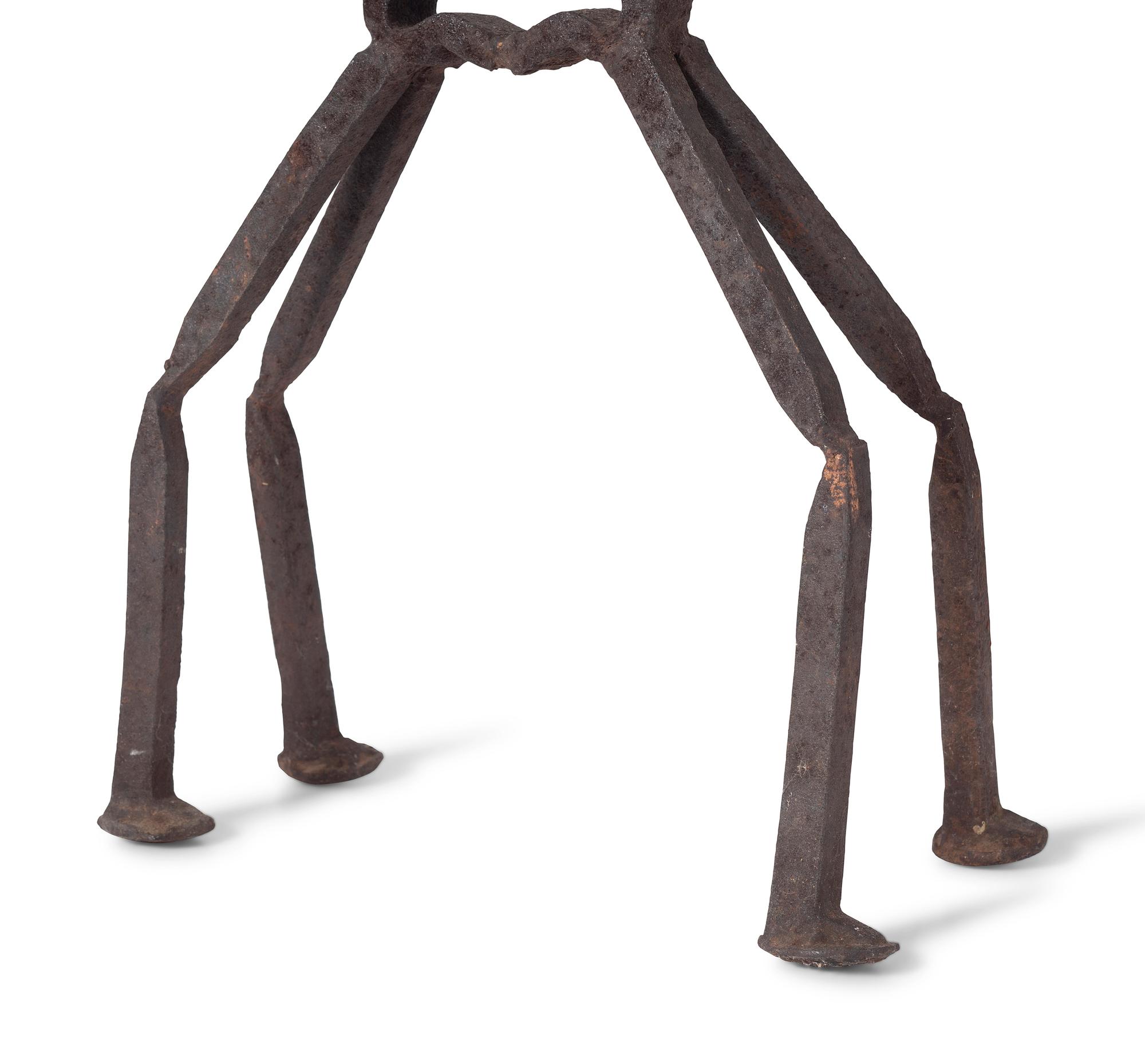 A Wrought Iron Camel Form Garden Figure