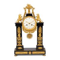 An Empire Patinated and Gilt Bronze Mantel Clock