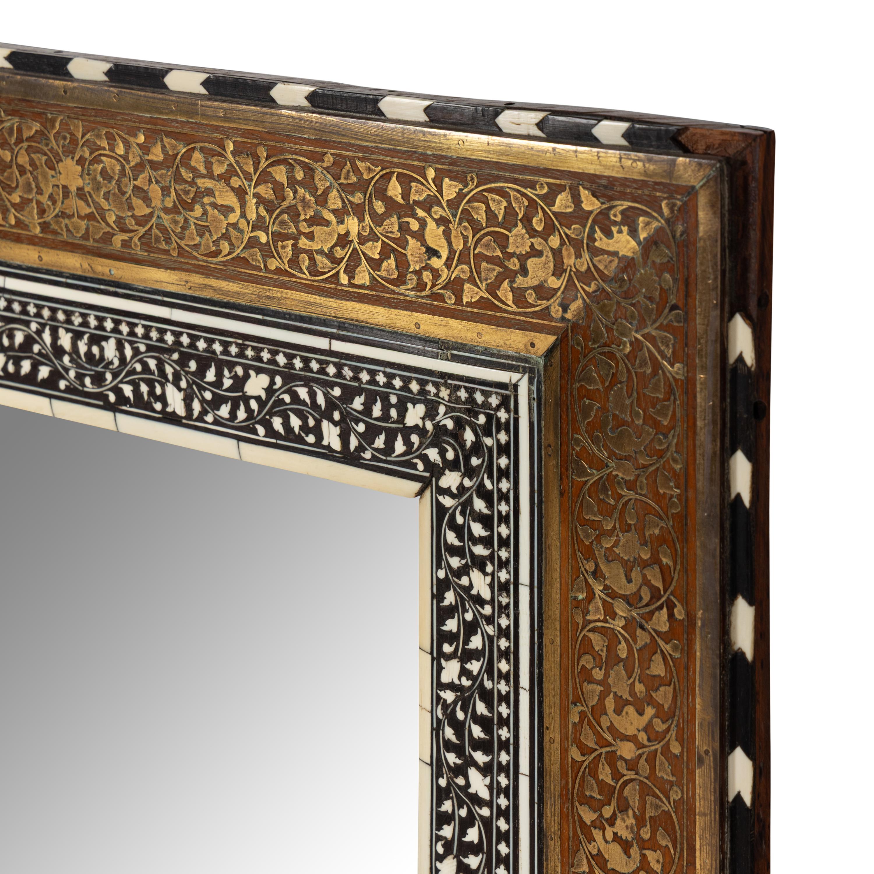 An Anglo-Indian Cut Brass and Bone Inlaid Hardwood Mirror