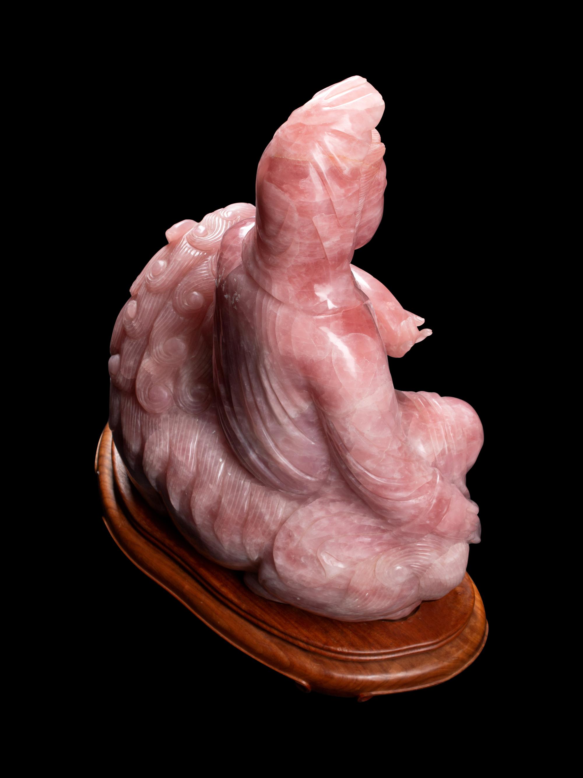 A Chinese Carved Rose Quartz Figure of Guanyin
