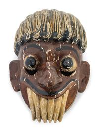 A Mexican Carved and Polychromed Wood Mask