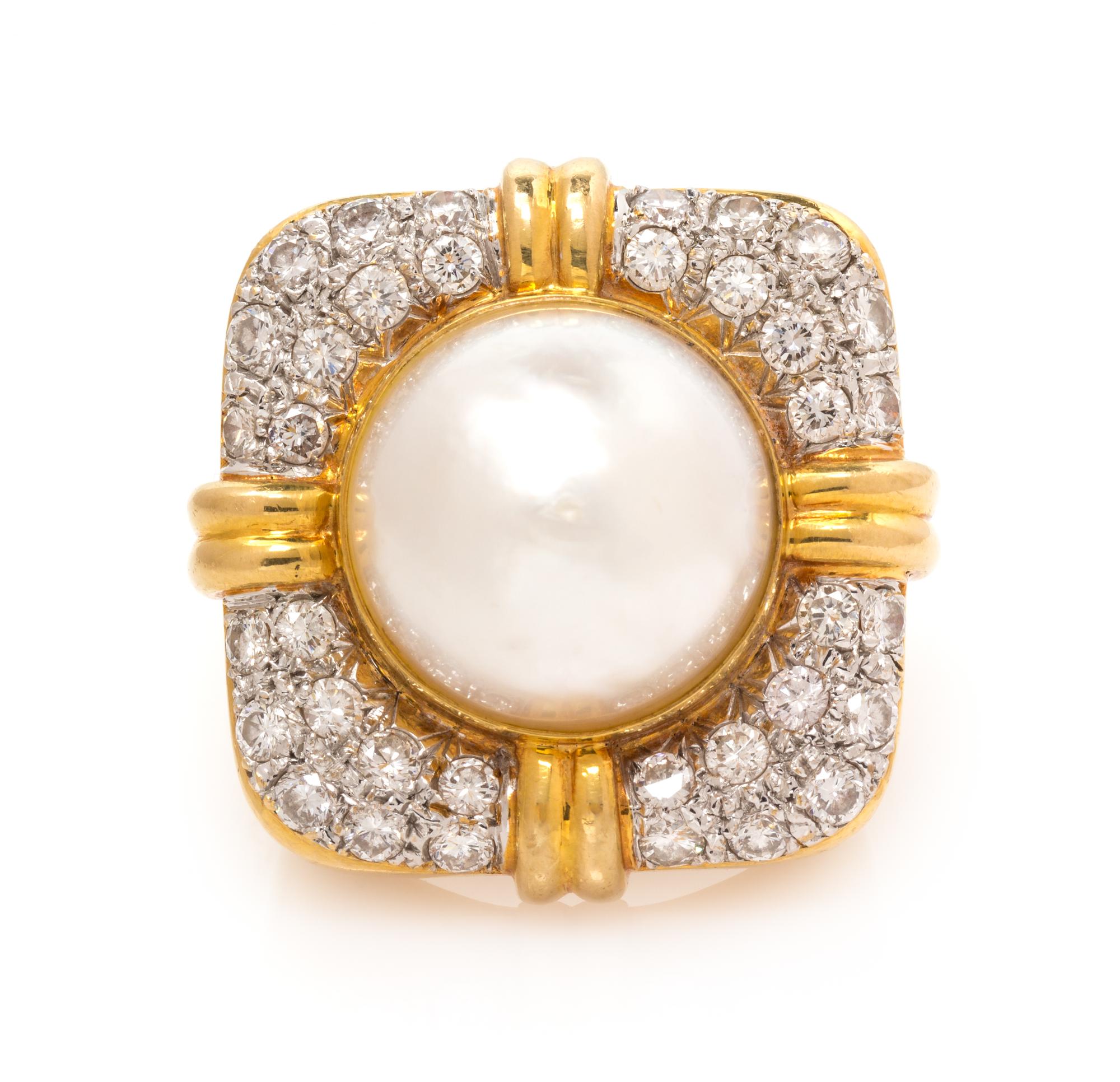 An 18 Karat Bicolor Gold, Cultured Mabe Pearl and Diamond Ring, 15.30 dwts.