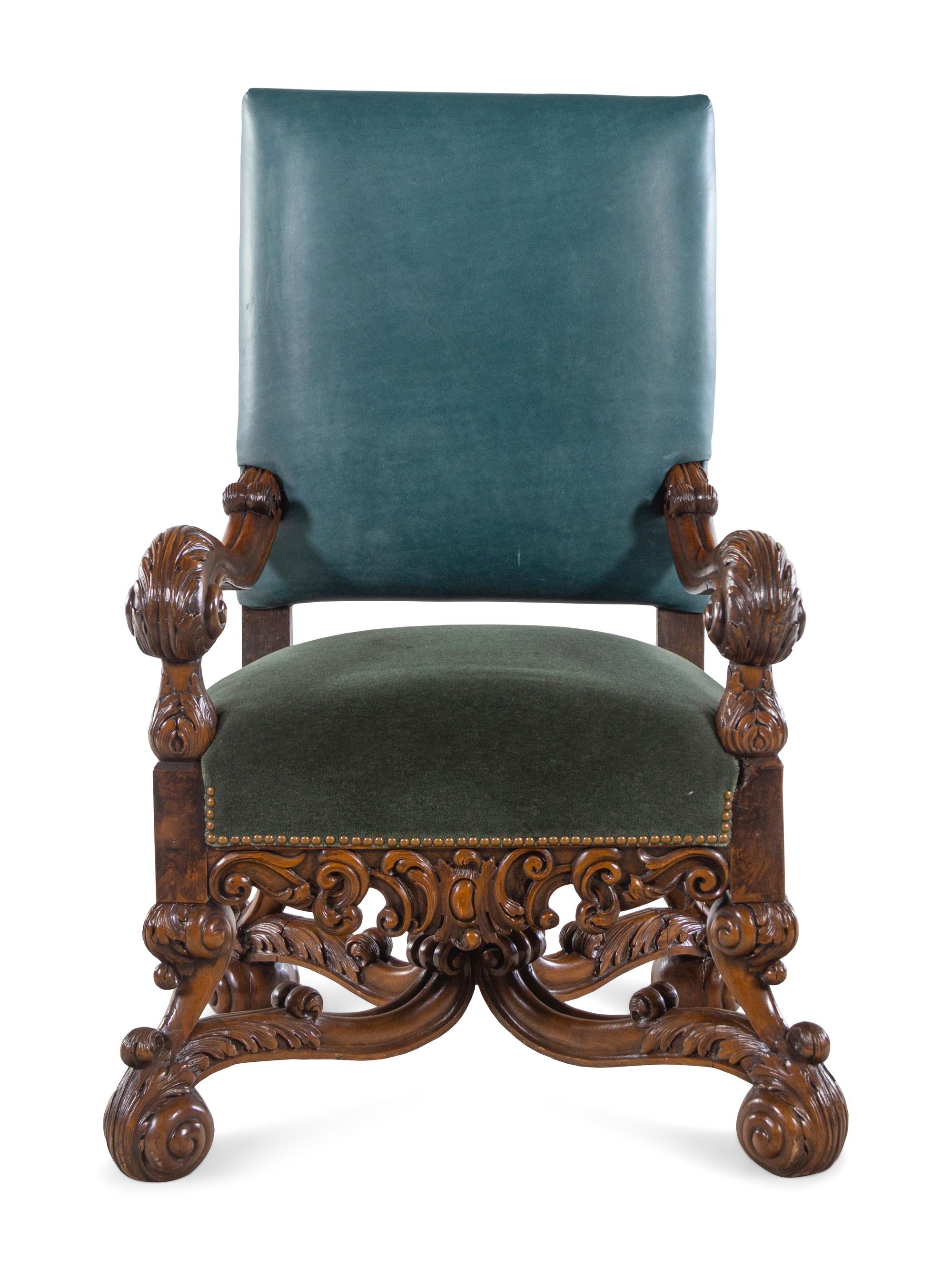 A Henri II Style Carved Walnut Armchair with Green Leather and Mohair Upholstery