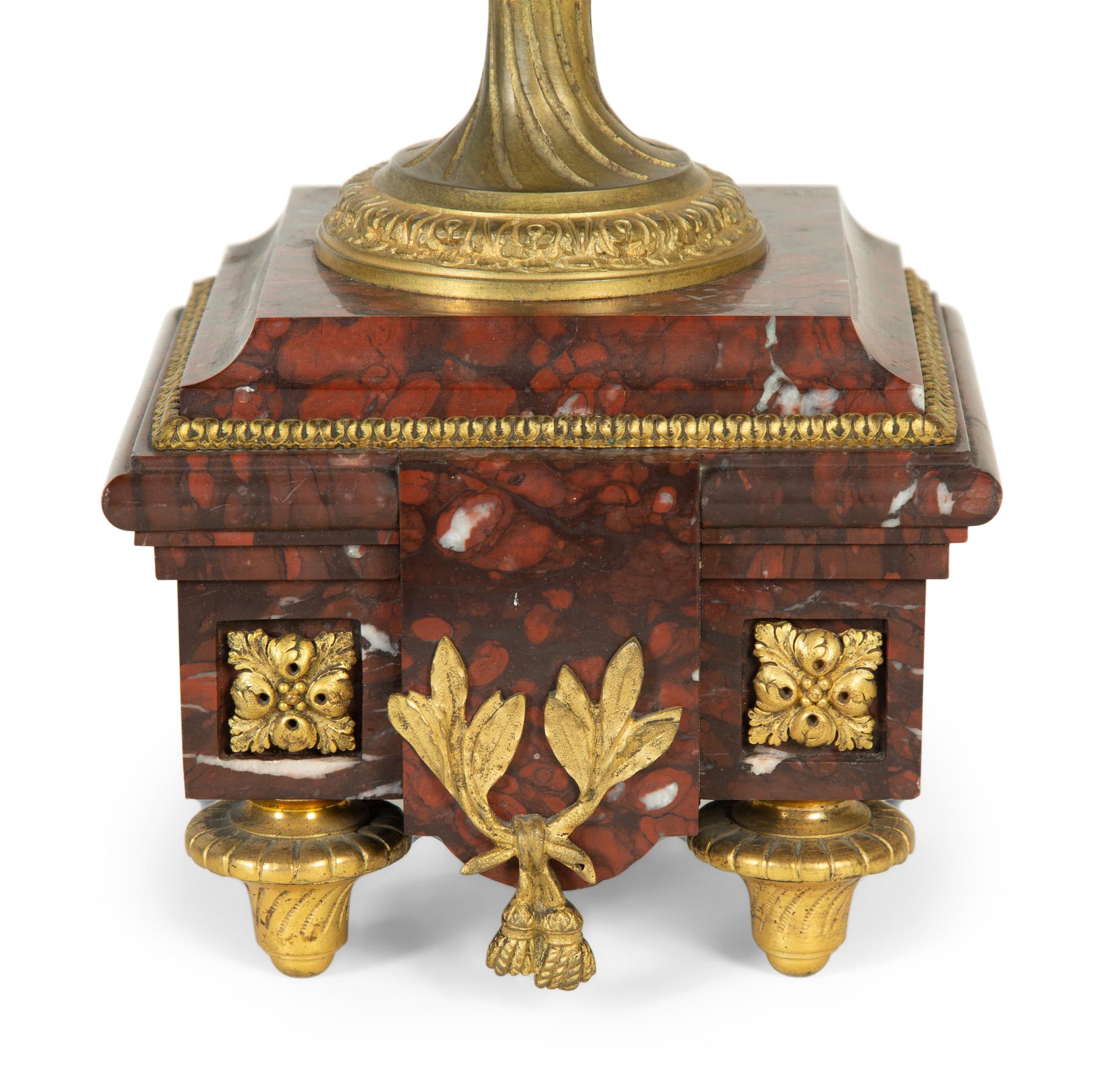 A Pair of French Gilt Bronze and Marble Urn-Form Six-Light Candelabra