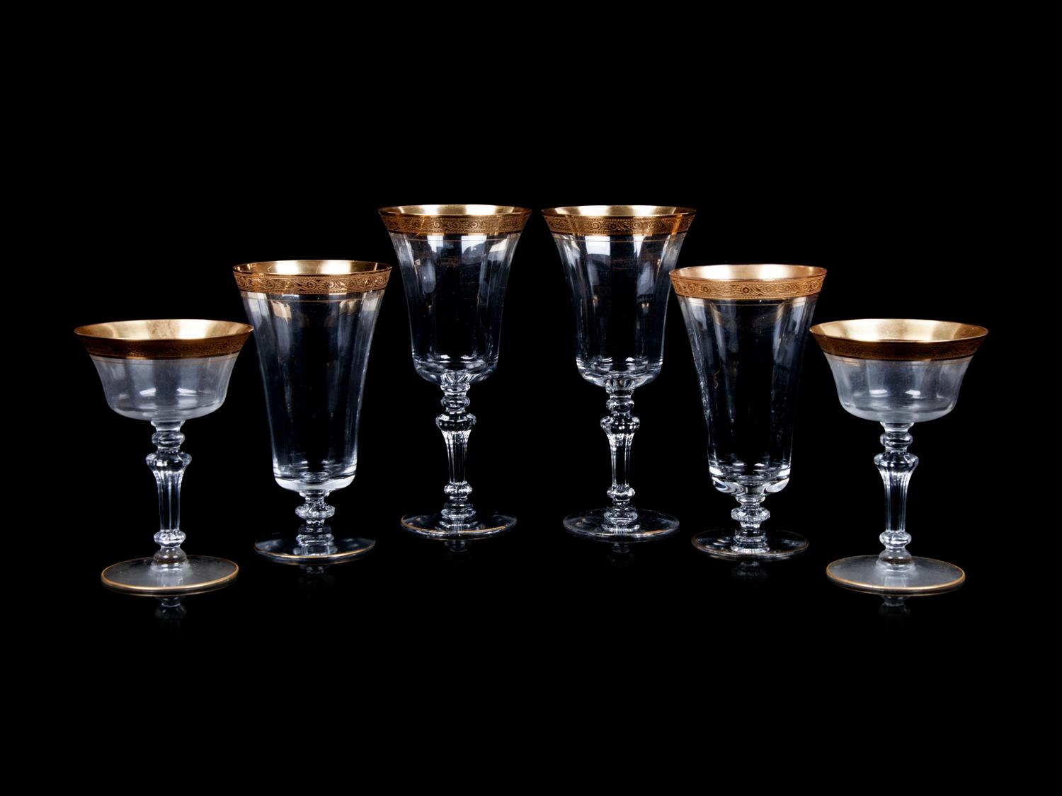A Set of Gilt Decorated Stemware