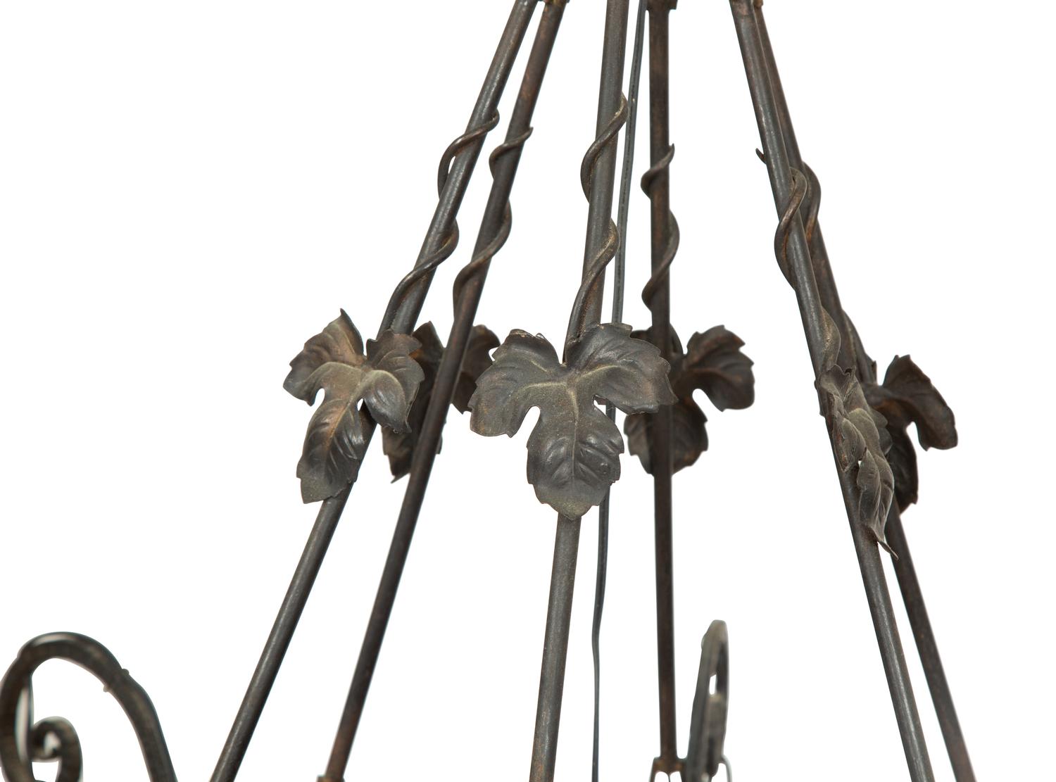 An Art Deco Wrought Iron and Glass Chandelier by Degue