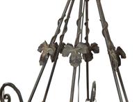 An Art Deco Wrought Iron and Glass Chandelier by Degue