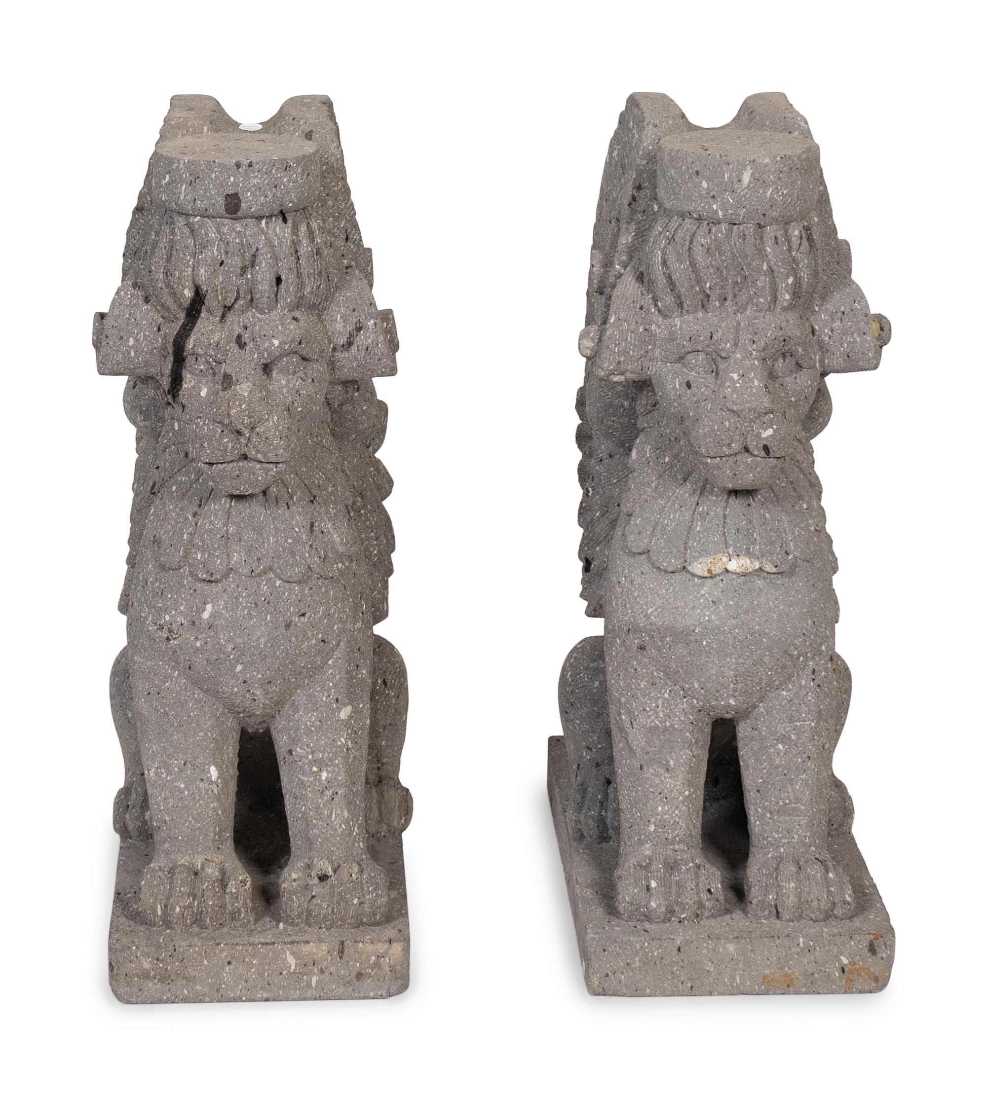 A Pair of Cantera Stone Griffin-Form Pedestals