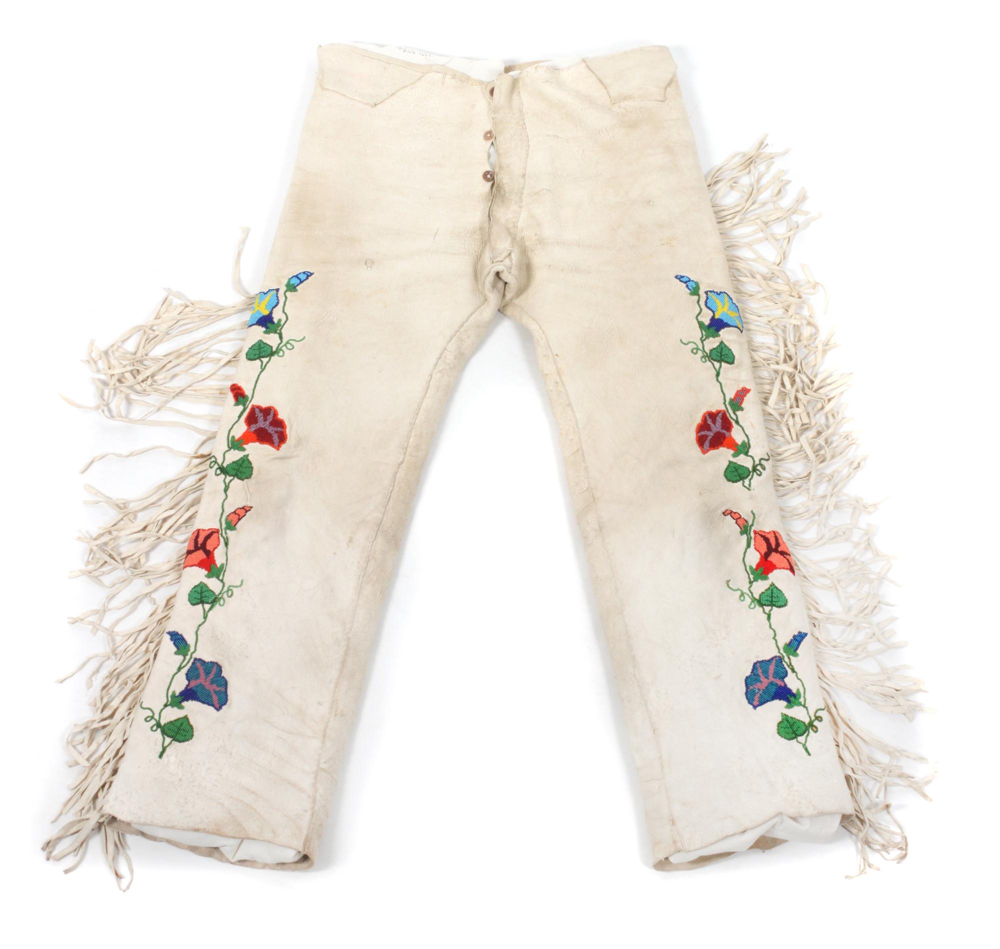Two Crow Hide and Beaded Outfits Length of one shirt 32 inches. — MID-20TH CENTURY