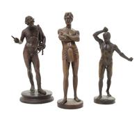 A Group of Three Bronze Figures Height of tallest 10 inches.