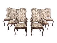 A Set of Eight Italian Baroque Style Fruitwood Dining Chairs