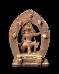 A Sino-Tibetan Bronze Figure of a Deity