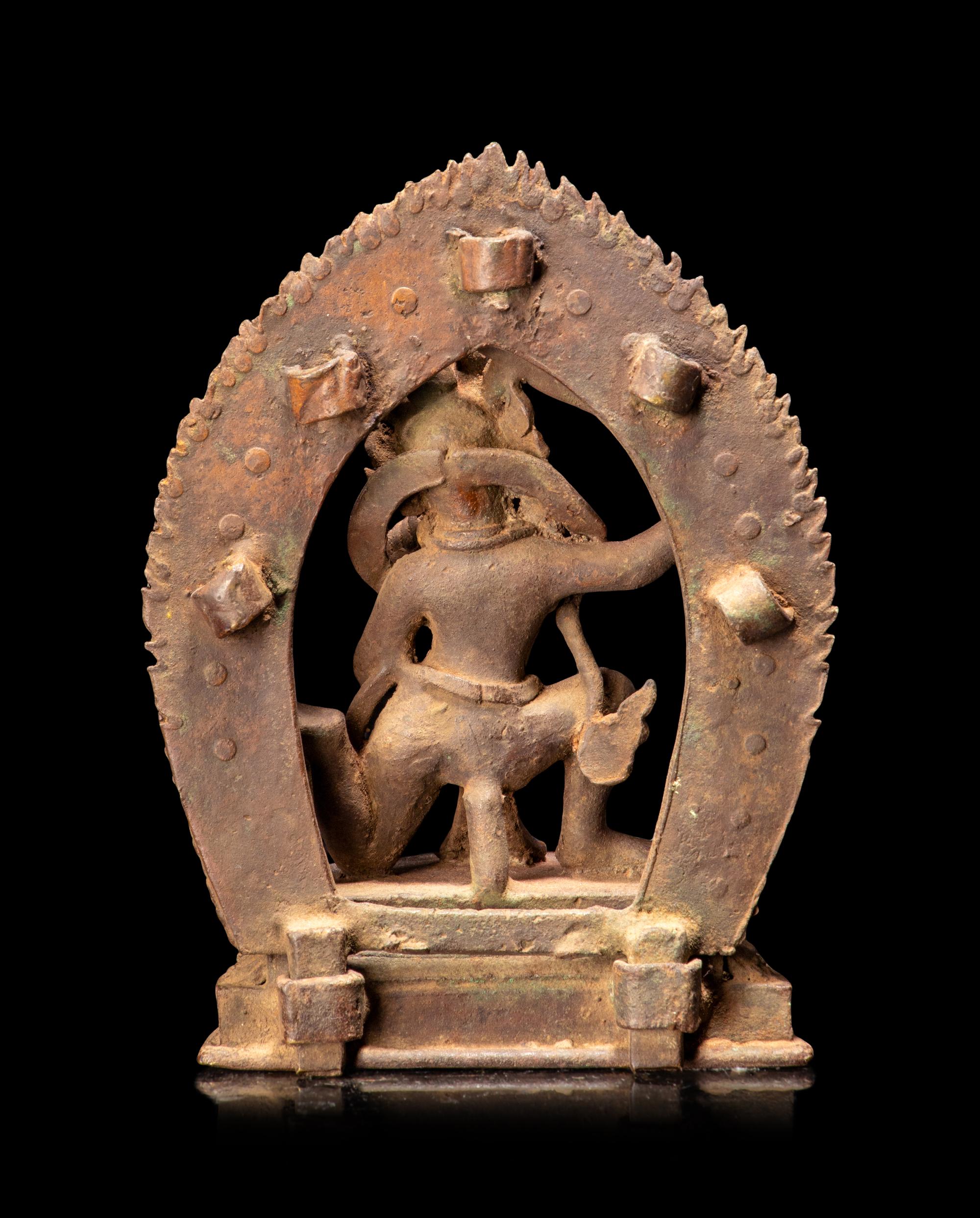 A Sino-Tibetan Bronze Figure of a Deity