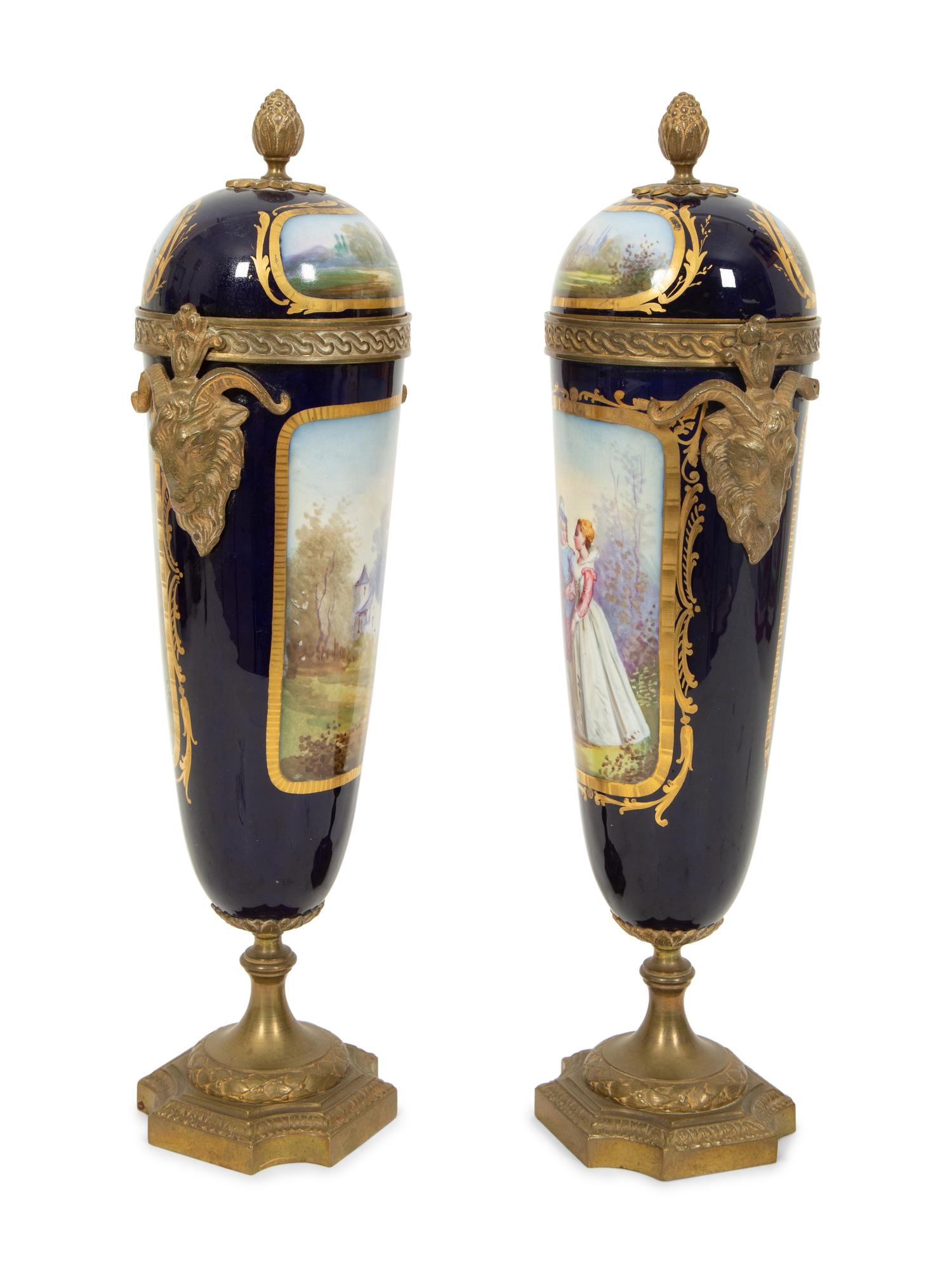 A Pair of Gilt Bronze Mounted Sevres Style Porcelain Urns
