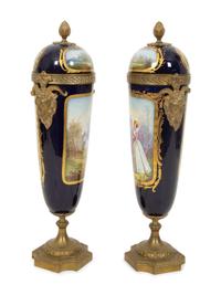 A Pair of Gilt Bronze Mounted Sevres Style Porcelain Urns