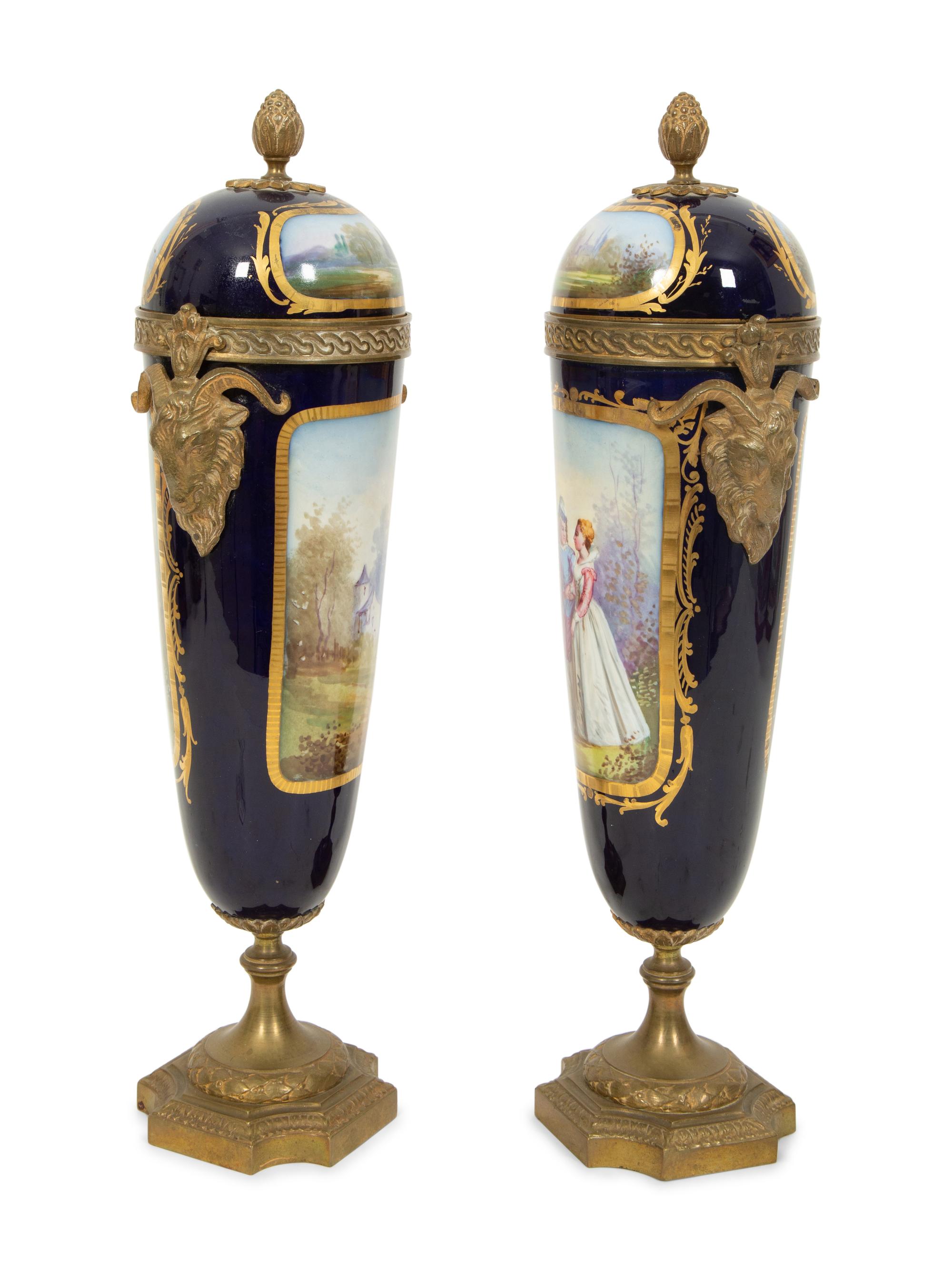 A Pair of Gilt Bronze Mounted Sevres Style Porcelain Urns