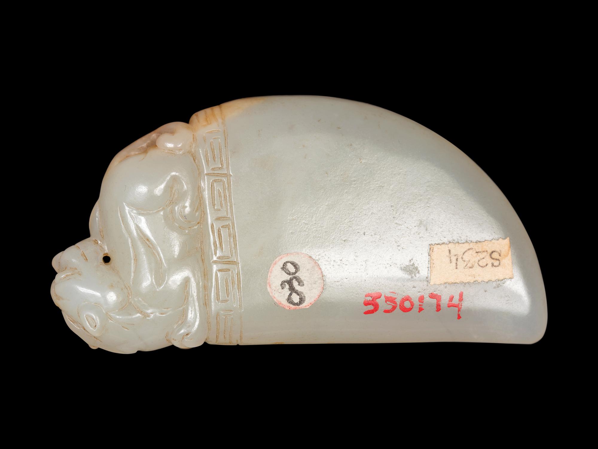 A White Jade Axe-Form Pendant