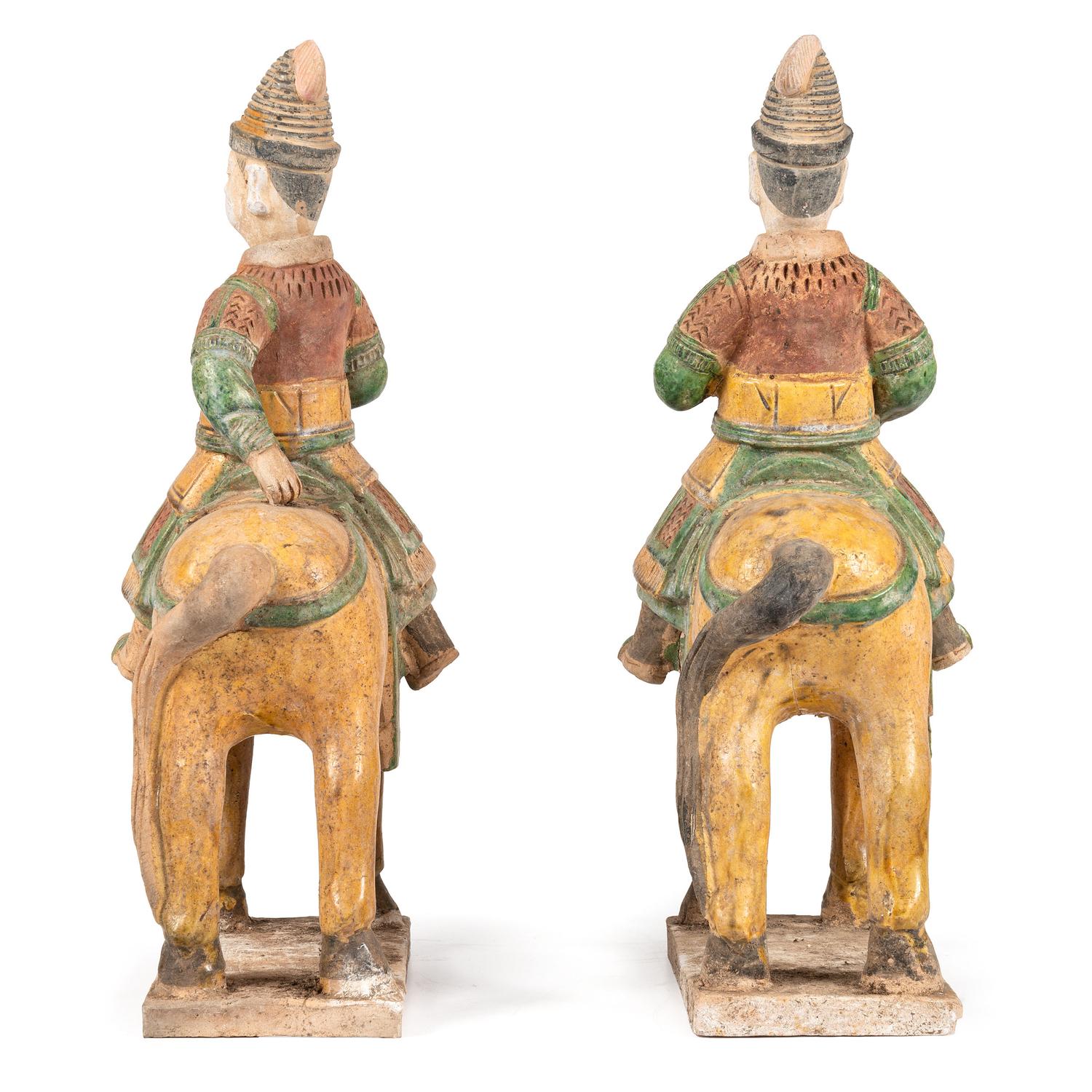 A Pair of Chinese Terracotta Equestrian Figures