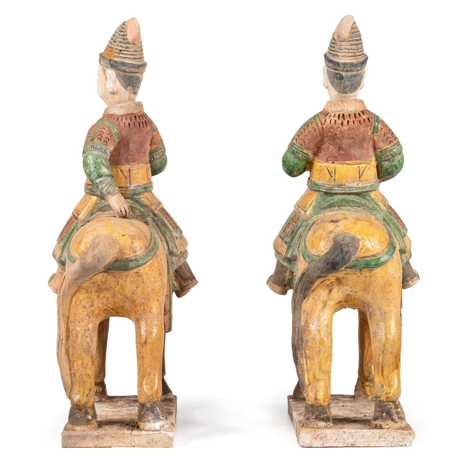 A Pair of Chinese Terracotta Equestrian Figures