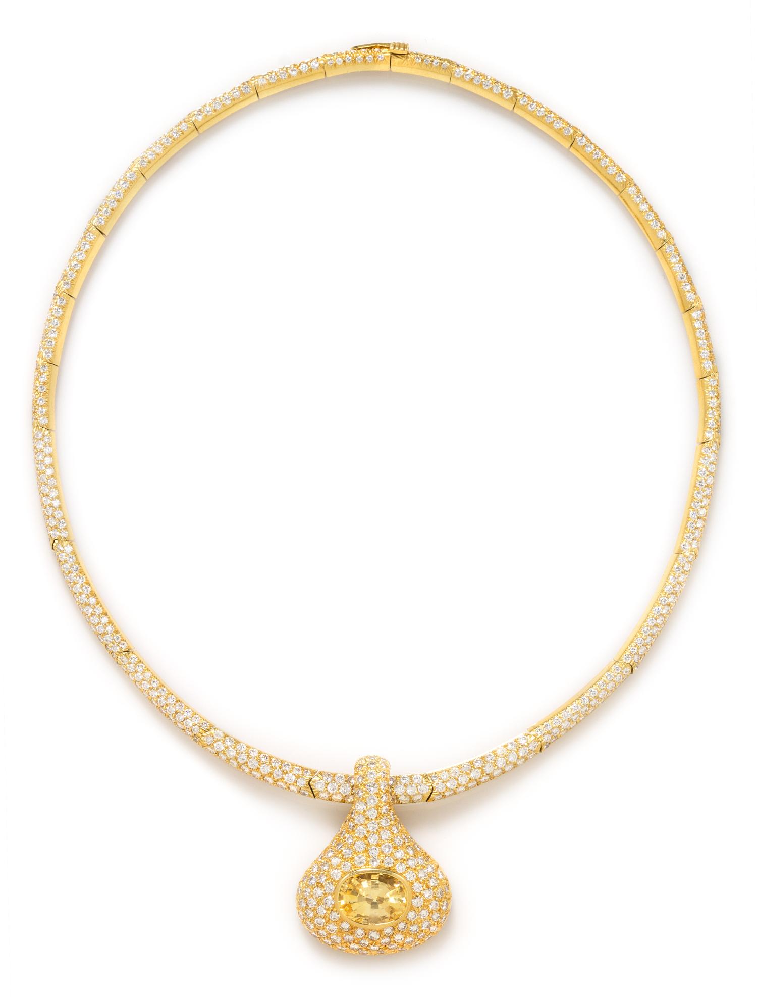 An 18 Karat Yellow Gold, Yellow Sapphire and Diamond Pendant/Necklace, 40.50 dwts.